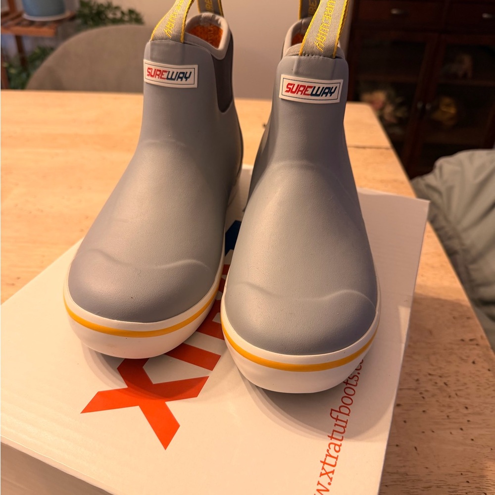 Never worn Men’s Grey Slip-On Sureway Rain Boots with Yellow Accent